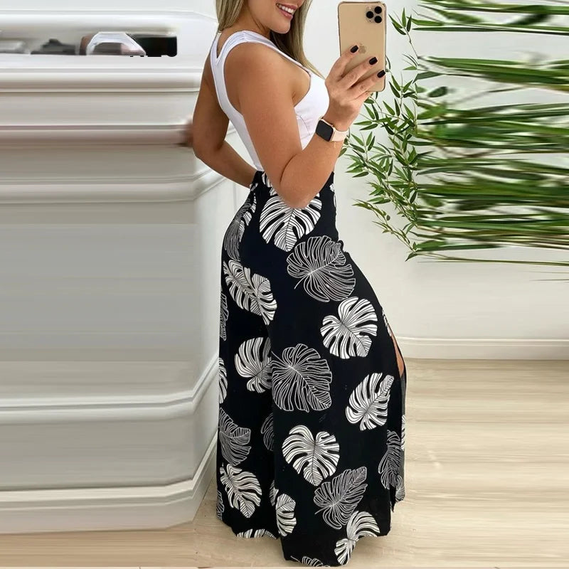 Damen Sommeranzug, einfarbiges bauchfreies Tanktop und weite Hose mit tropischem Print und Schlitz