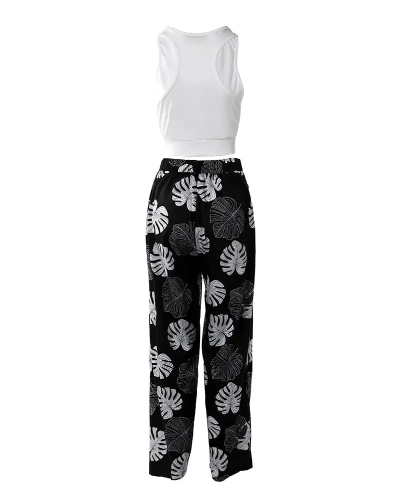 Damen Sommeranzug, einfarbiges bauchfreies Tanktop und weite Hose mit tropischem Print und Schlitz